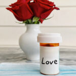 Love prescription bottle with rose bouquet