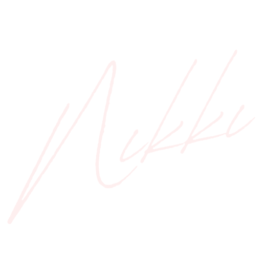Stylized signature text saying "Nikki