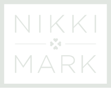 NIKKI MARK brand logo with flower icon.